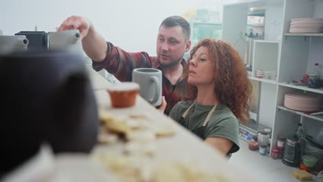 Potters Inspecting Pottery