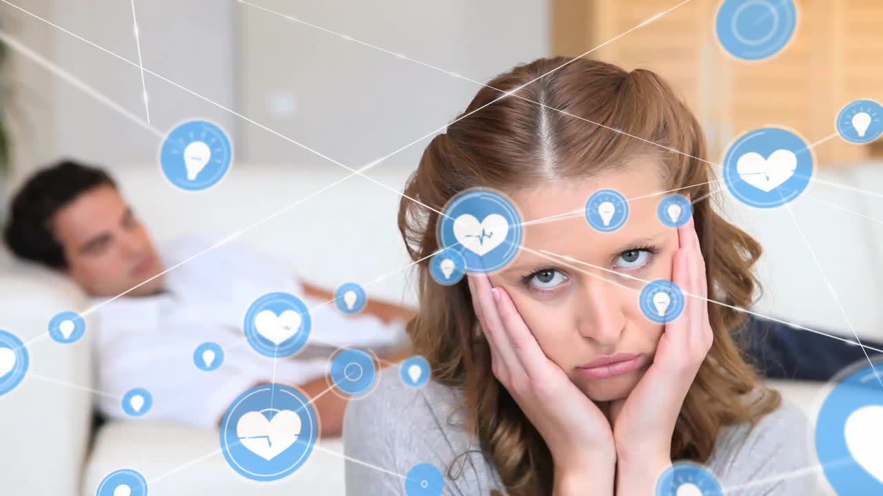 анимация сети связей с иконами над грустной кавказской парой