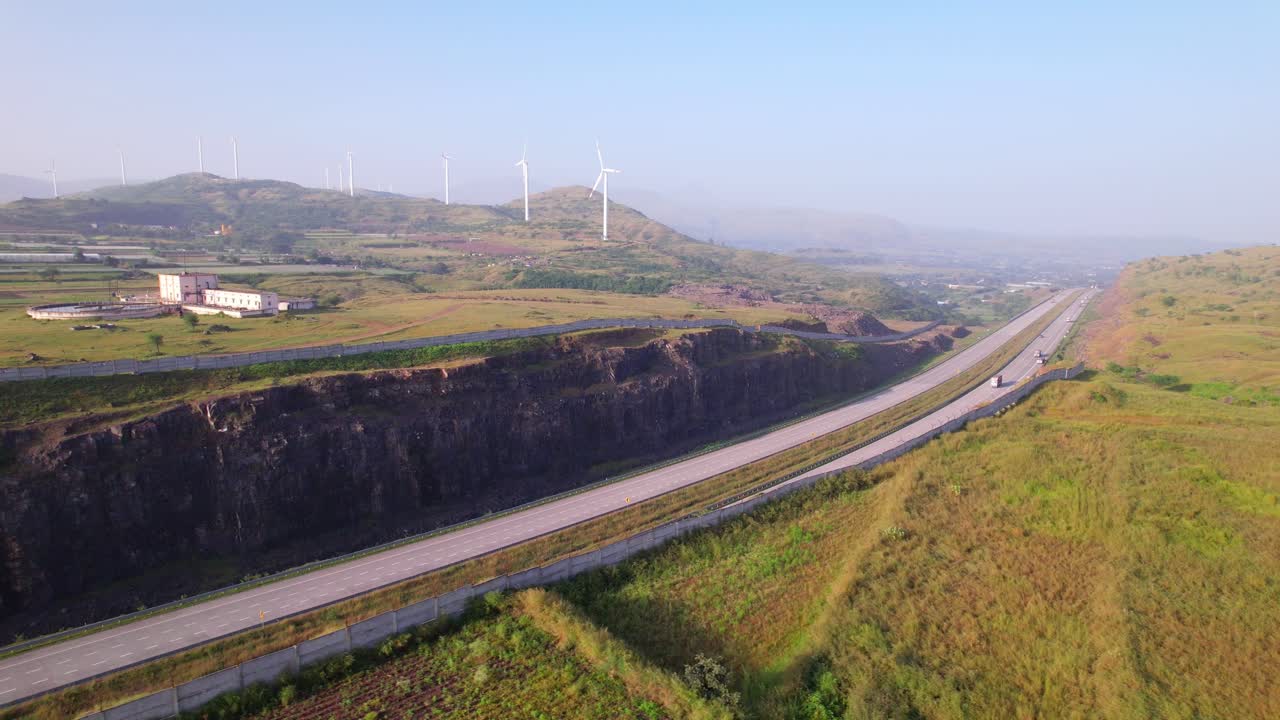 Mumbai Nagpur Expressway through wind farms, green corridor, Maharashtra, Drone shot