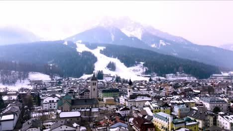 aerial view of the alpine town of san candido in italy.