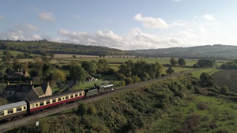 cotswolds steam train running along the gloucestershire and worcestershire border of the cotswolds