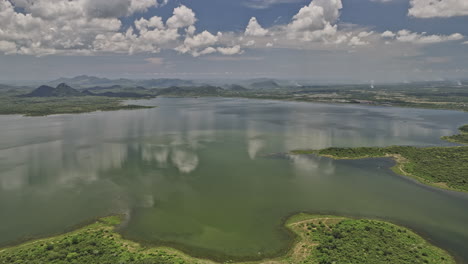 bogahawewa sri lanka aerial v2 panoramic views, drone flyover lunugamvehera reservoir national park capturing vast water body and thriving wetland vegetations - shot with mavic 3 cine - april 2023