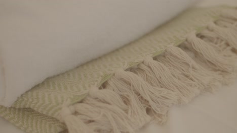 Close-up-shot-of-white-rolled-fabric