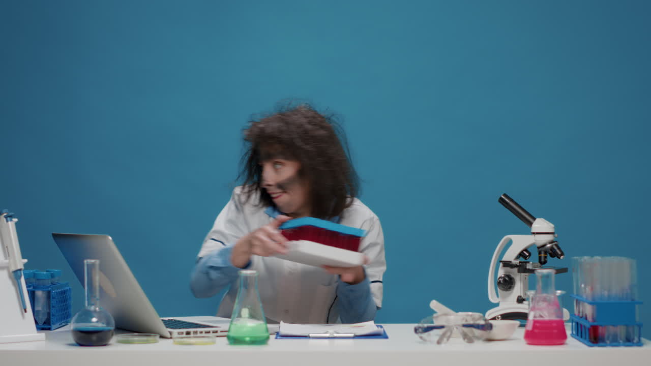 Crazy goofy scientist feeling confident and holding test tubes