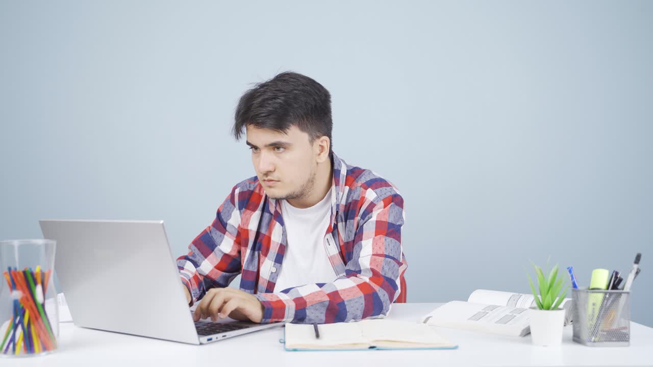 Man working hard on laptop. | Premium Stock Video Footage