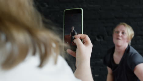 Woman-recording-video-indoors