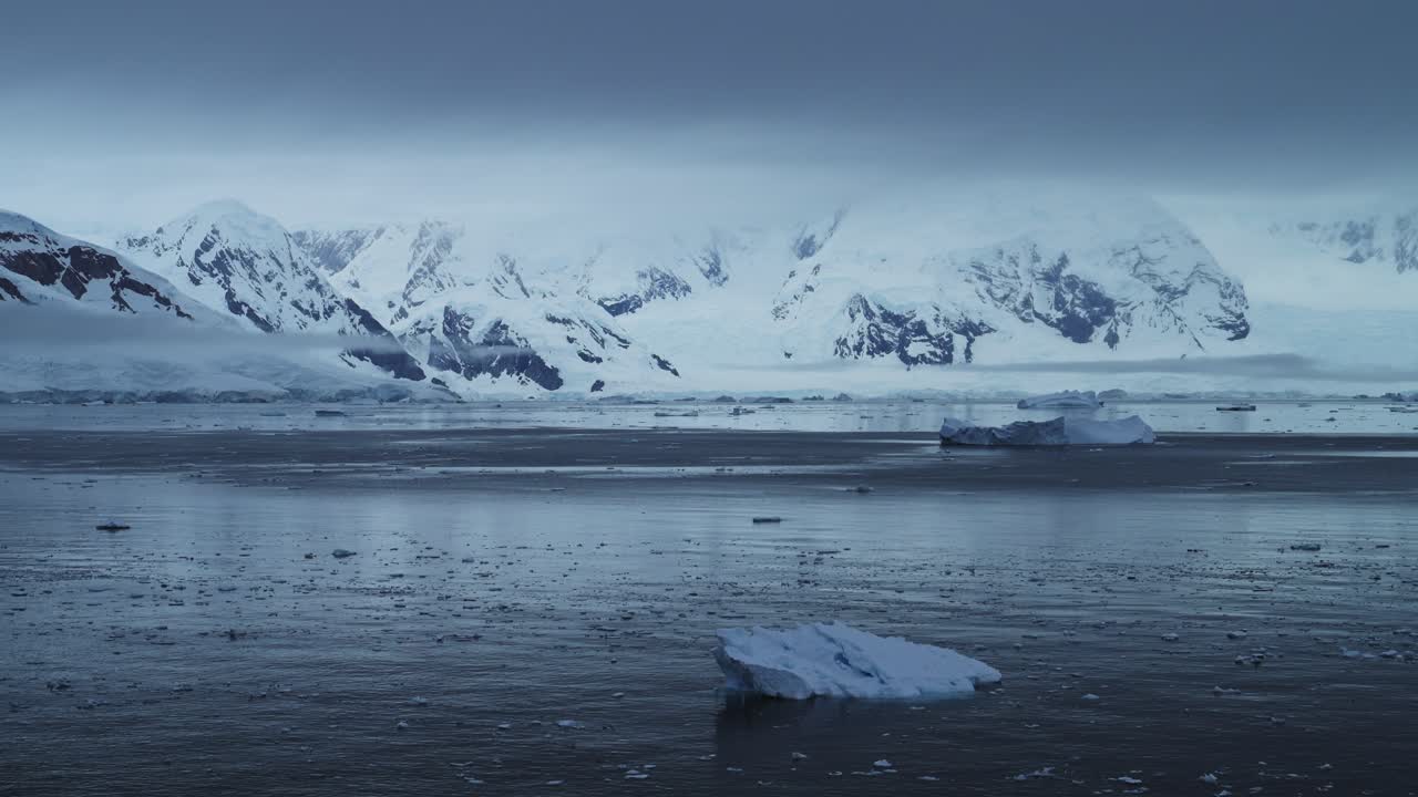 Dark Moody Winter Coastal Seascape, Antarctica Ocean Scenery with Iceberg Mountains and Sea, Beautiful Dramatic Blue Coast Landscape on Antarctic Peninsula, Icy Winter Sea Scene with Ice
