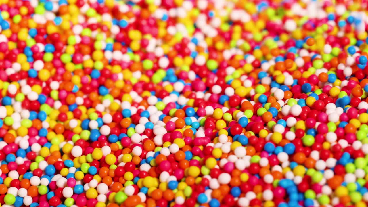 el dedo interactuando con salpicaduras vibrantes y coloridas