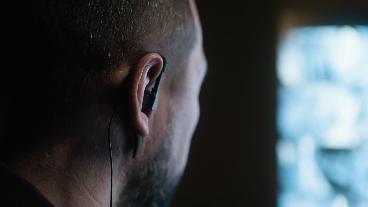 Man working in the hut at night