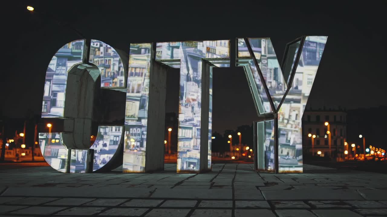 Cityscape Illuminated Concrete Sculpture at Night