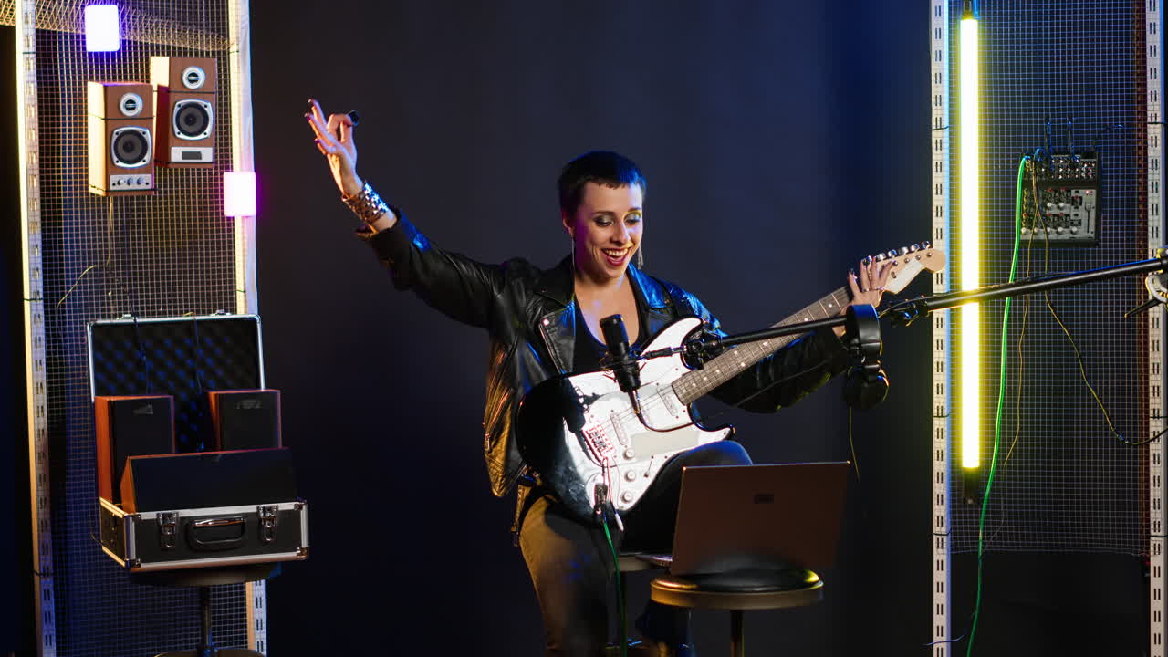 Musician Performing with Guitar in Studio