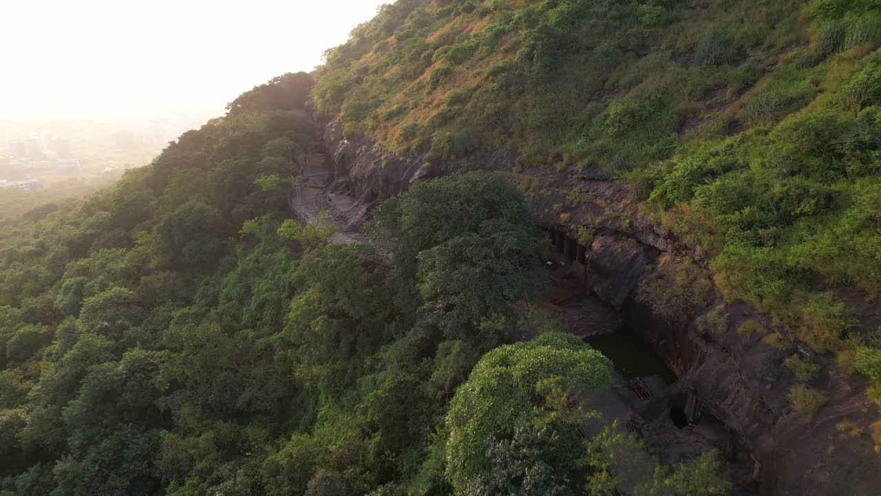 Historical Nashik Caves or Pandavleni Buddhist site in monsoon, Maharashtra, Revealing drone shot
