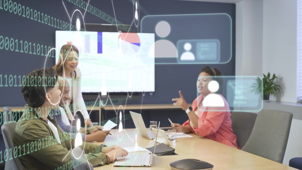 Corporate meeting lead walking to table starting AR data stream, team reviewing charts for metrics