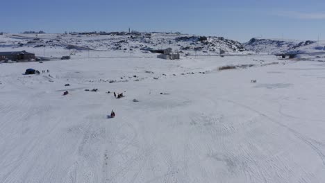 Aerial-of-sled-horse-carriage-on-frozen-cildid-lake-in-turkey