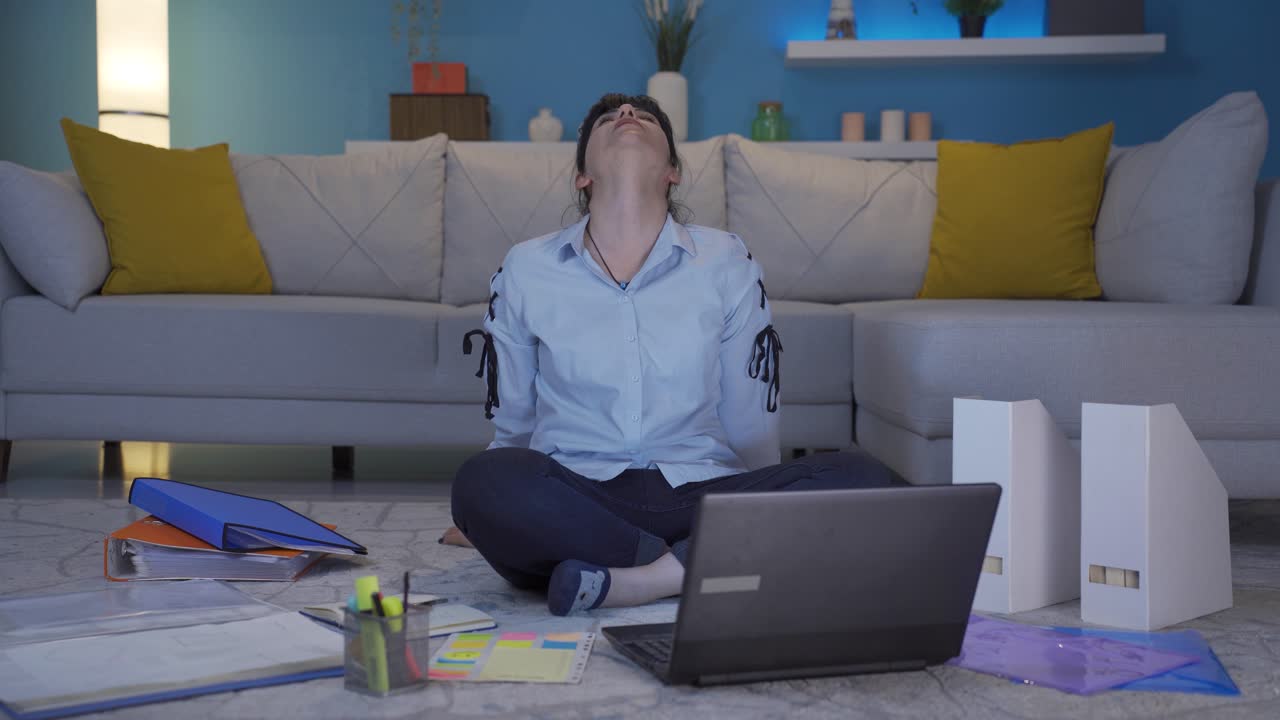 Home office worker woman taking a break from her work.