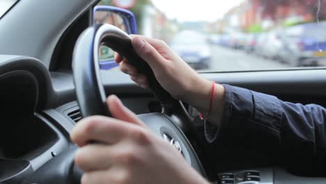 man driving a car