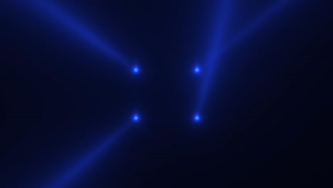 haces de luz azul brillante en el escenario