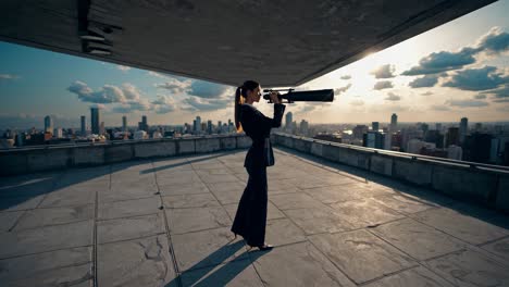 businesswoman with telescope on rooftop
