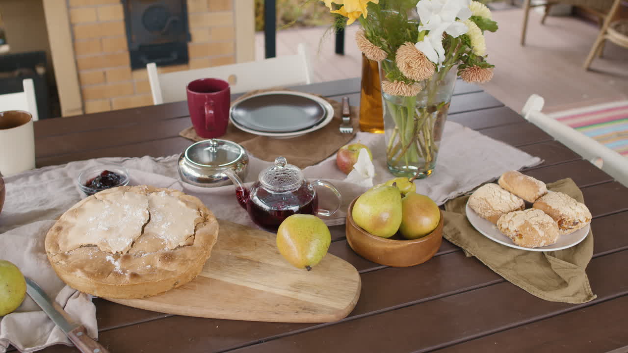 Table Setting with Pie, Fruit, and Flowers