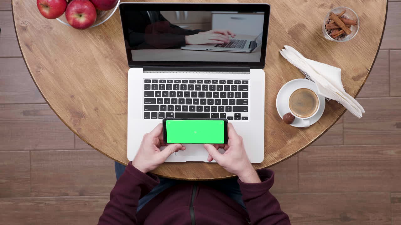 Workspace with Laptop and Smartphone