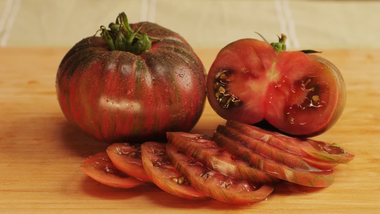 Sliced Heirloom Tomato on Wooden Cutting Board