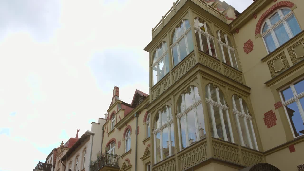 Low angle shot of polish architecture of buildings in a town of Sopot, Poland during summer morning. 4k.