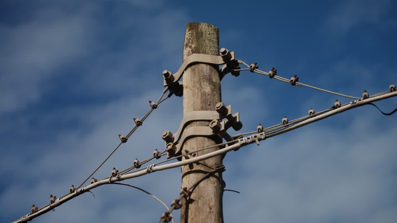 An old wooden electric post for electrical transmission