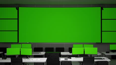 control room with green screen monitors