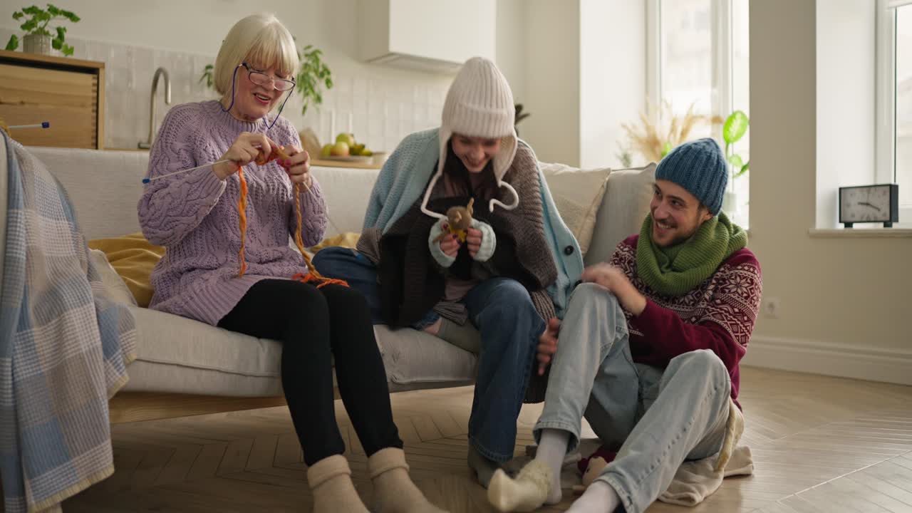 Grandparents and grandchildren enjoying a cozy winter day together