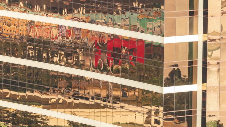 Colorful Distorted Reflections on a Modern Glass Building Facade