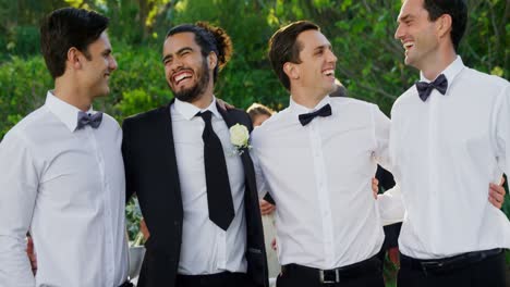 groom and groomsmen happily posing 4k 4k