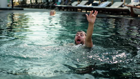 man drowning in the pool