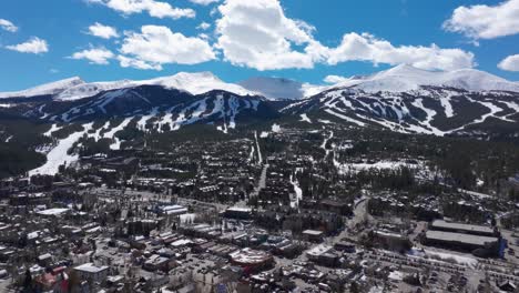 high elevation drone shot flying towards breckenridge ski resort in colorado