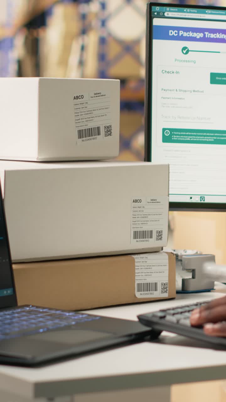 Vertical Video Black employee works with AI tools to enhance package tracking efficiency