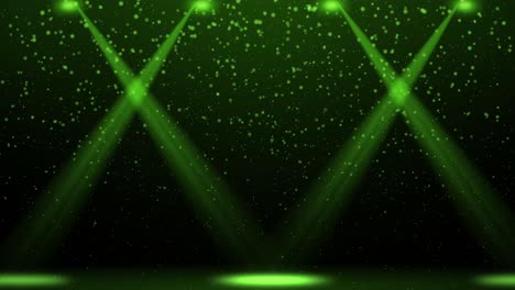 green spotlights and particles in dynamic motion