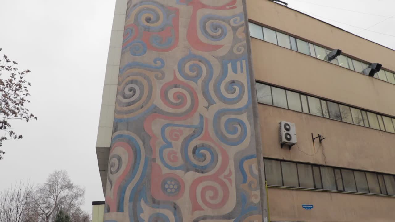 Mosaic on a buildings in Tashkent, Uzbekistan. Soviet architecture in the city.