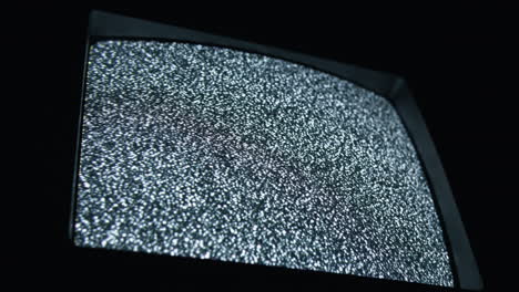 tv static and noise glitch on vcr television screen with bad signal
