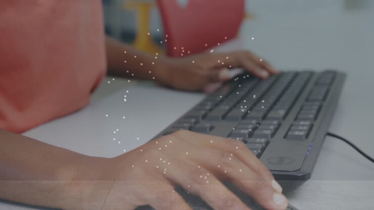 Abstract star shape against mid section of a girl using computer at school