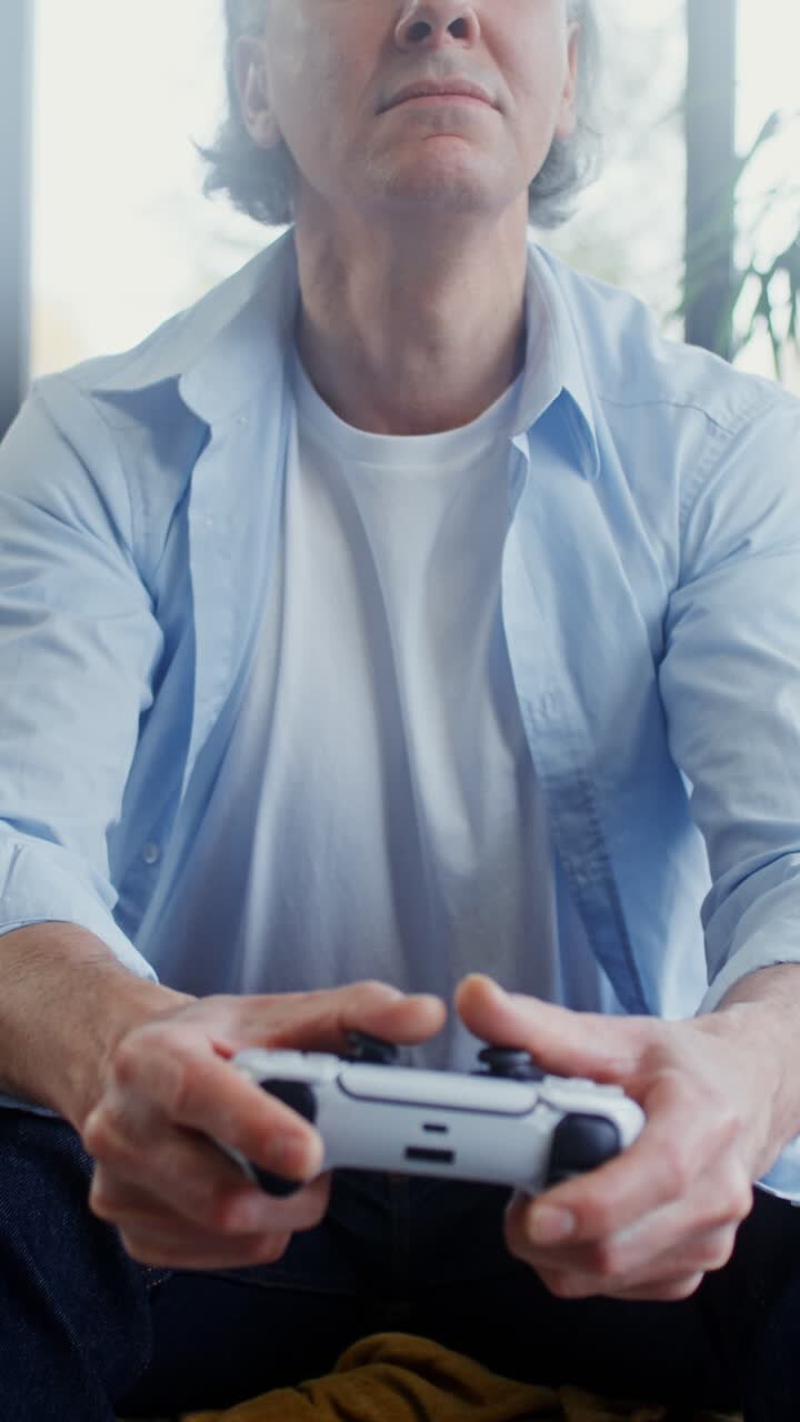 Man playing video games with a controller