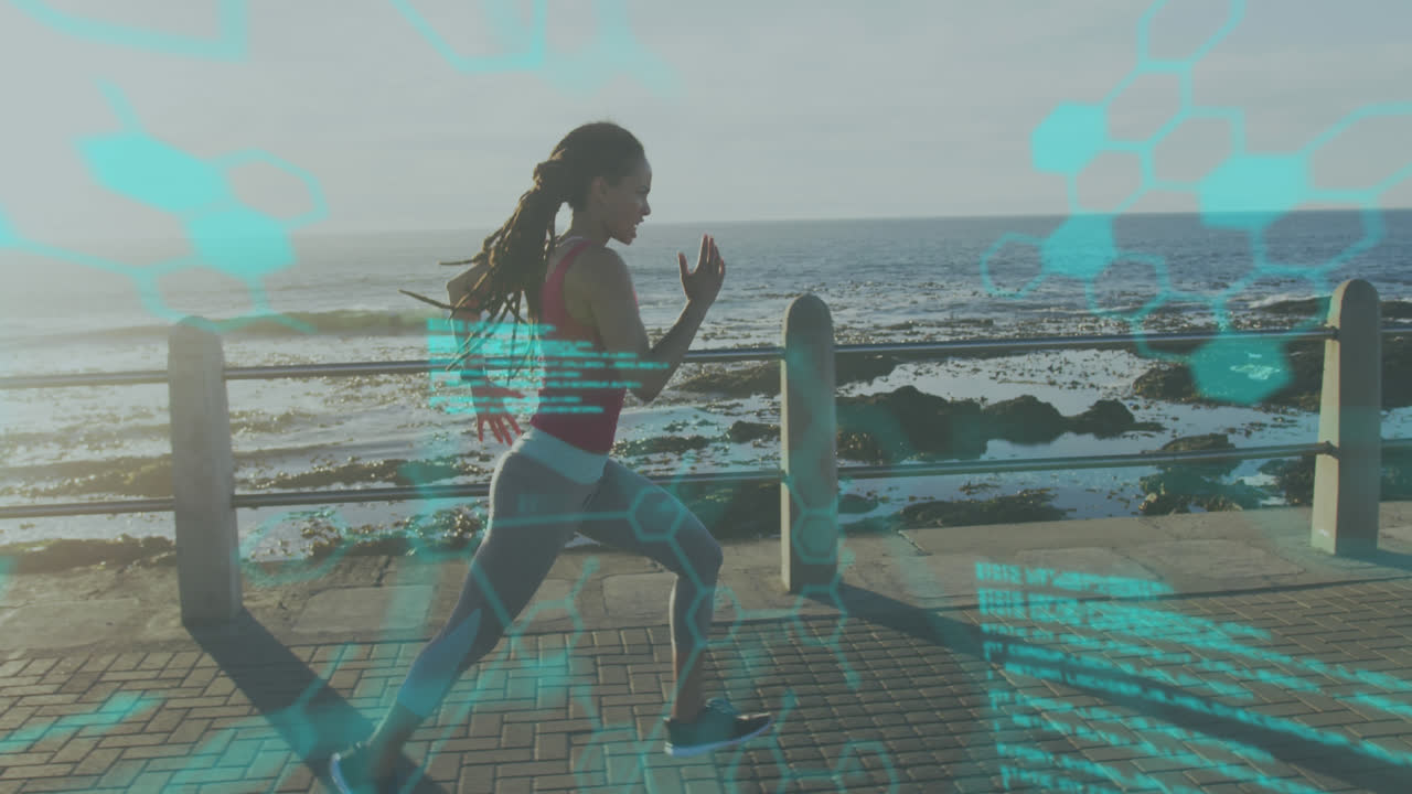 procesamiento de datos médicos contra la mujer afroamericana en forma corriendo en el paseo marítimo