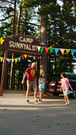 a joyful group of children and an adult at a summer camp