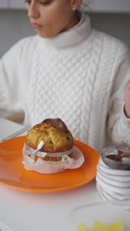 girl baking panettone with nutella