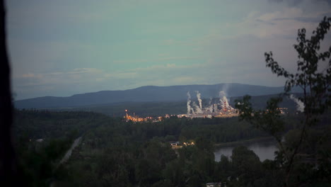 over-view-Sawmill-time-lapse-from-a-hill-forest-cloudy-sky