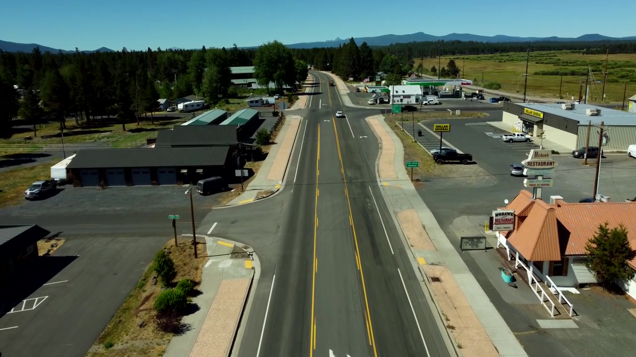 US, Oregon, Crescent, 2026-07-09 - Drone view of highway 97 and the city's dowtown area, in Summer