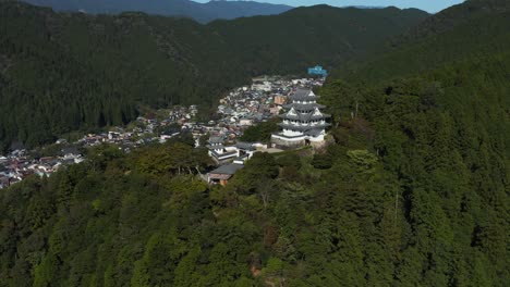 gifu japan, gujo hachiman castle standing over rural town in the mountains