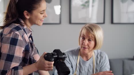 video of senior woman learning how to film a video blog