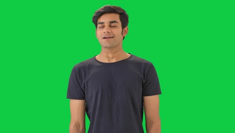 Indian-boy-relaxing--Green-screen