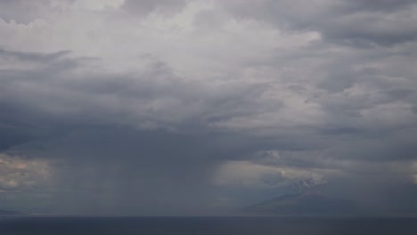 aerial view of a rainy day and clouds on the sea near vesuvius, naples and capri, timelapse