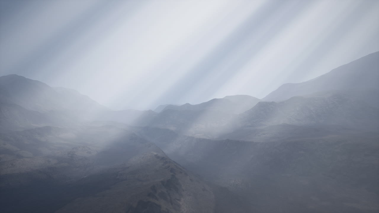 Sun Rays against the Backdrop of the Mountains