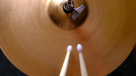 drum stick playing hi-hat